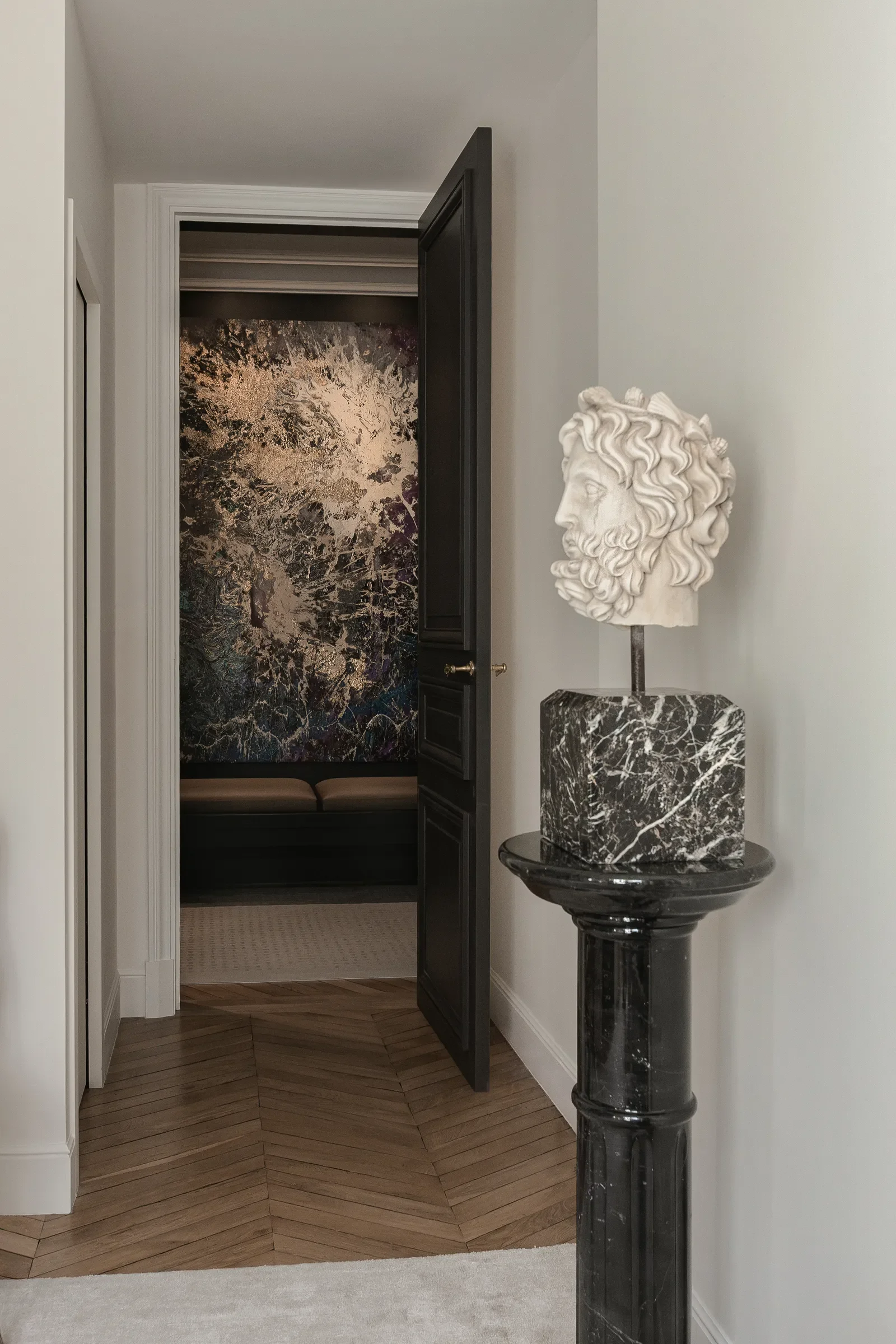 Crown moldings framing abstract paintings